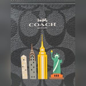 Coach NYC Skyline Small Wristlet in Signature coated canvas.